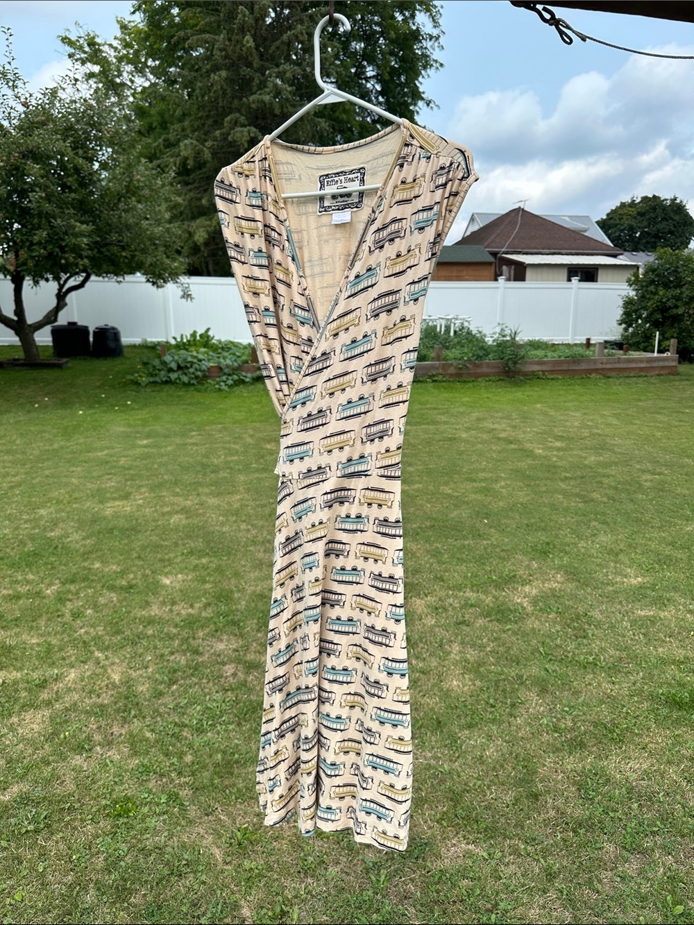 Effie's Heart Beige Printed Wrap Maxi Dress with Teal and Black Details